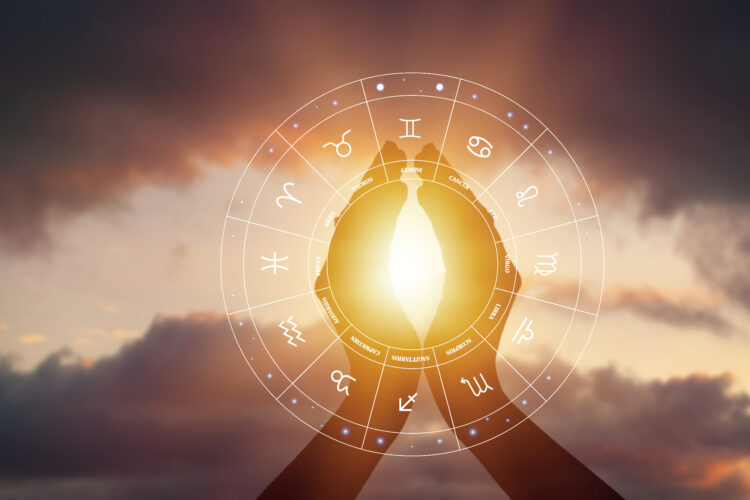 Summer sun concept with silhouette of young woman's hands relaxing, happy meditating